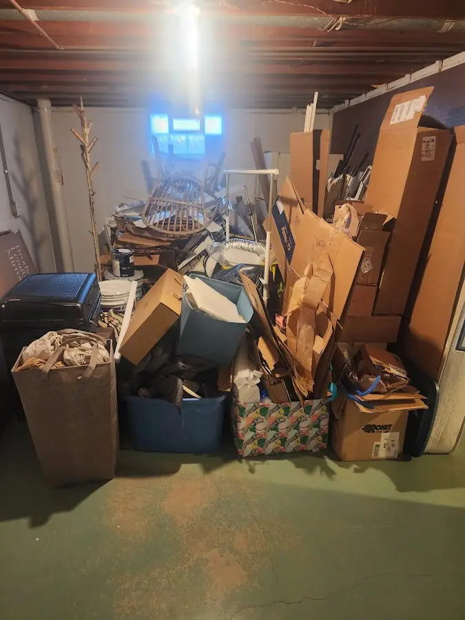 Roll-off dumpster container at job site for 8 Yard Dumpster Rental in Harvard